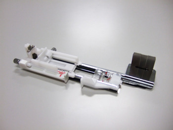 Knapphålsfot lång inkl stabiliseringsplatta